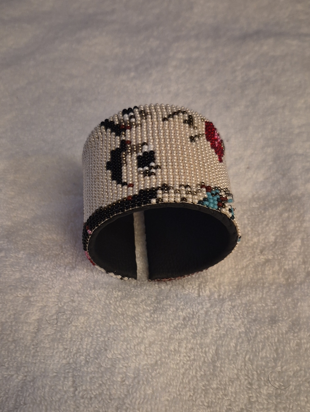 Hand-Beaded White and Black Cuff Bracelet with Red Accent